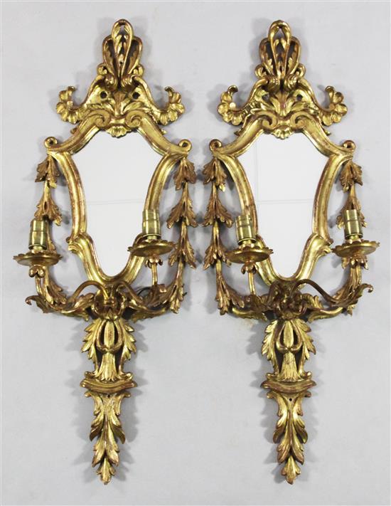 Pair of Italian carved giltwood girandoles(-)